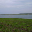 Big plot of agricultural land near lake
