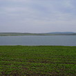 Big plot of agricultural land near lake