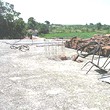 One Storey House And A New Building In Common Yard