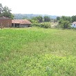 One Storey House And A New Building In Common Yard