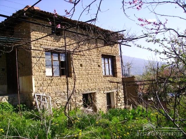 Rural House At The Foot Of The Mountain
