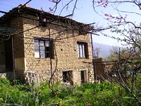 Rural House At The Foot Of The Mountain