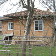 Solid rural house with additional building