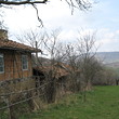 Solid rural house with additional building