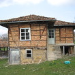 Solid rural house with additional building