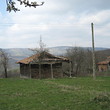 Solid rural house with additional building