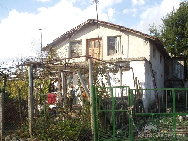 Two Storey House At The End Of The Village