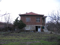 Two storey house at the end of a small village