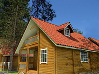 Wooden chalets on a lake close to Borovets