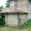 Old House In The Center Of A Village