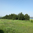 Regulated plot of land for sale on a lake near the sea