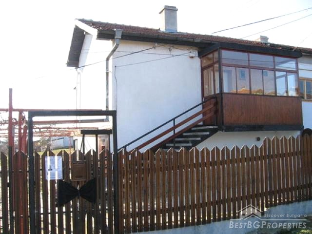 House On A Lake Near The Sea