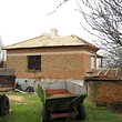 House With Farm Buildings