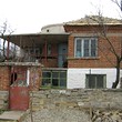 House With Farm Buildings