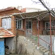 House With Farm Buildings