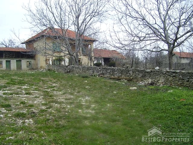 Old House Next To A Roman Fortress