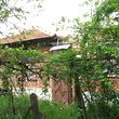 Small house with 4800 sq m garden in pretty village