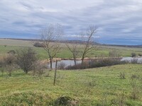 plot of land on a lake and close to the sea 