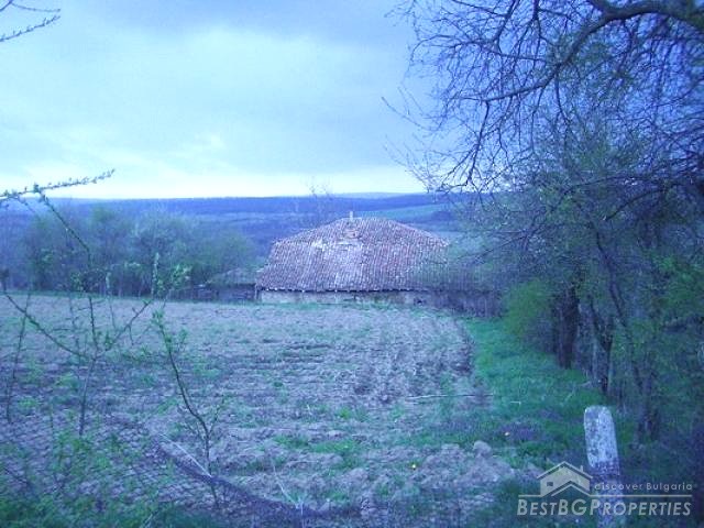 Rural House At The Foot Of The Mountain