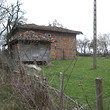 Solid rural house with additional building