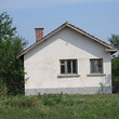 Small one storey house at the end of a village