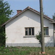 Small one storey house at the end of a village