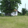 Small Rural House At The End Of A Village