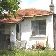 Small Rural House At The End Of A Village