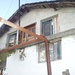 Two Storey House At The End Of The Village