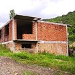 Unfinished House In The Mountain