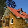 Wooden chalets on a lake close to Borovets