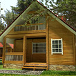 Wooden chalets on a lake close to Borovets