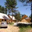 Wooden chalets on a lake close to Borovets