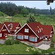 Wooden chalets on a lake close to Borovets