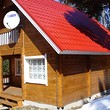 Wooden chalets on a lake close to Borovets