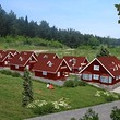 Wooden chalets on a lake close to Borovets